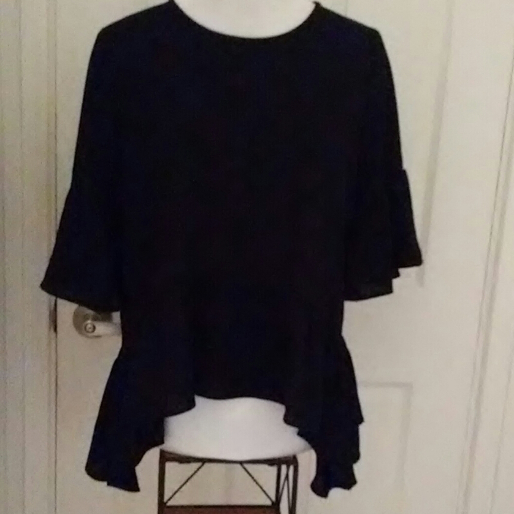 Beautiful silky black peplum top
